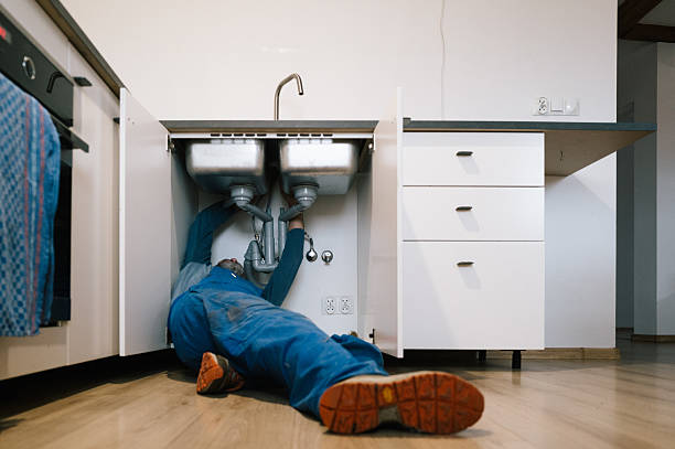 Professional Plumbing technician working in Clinton, IA